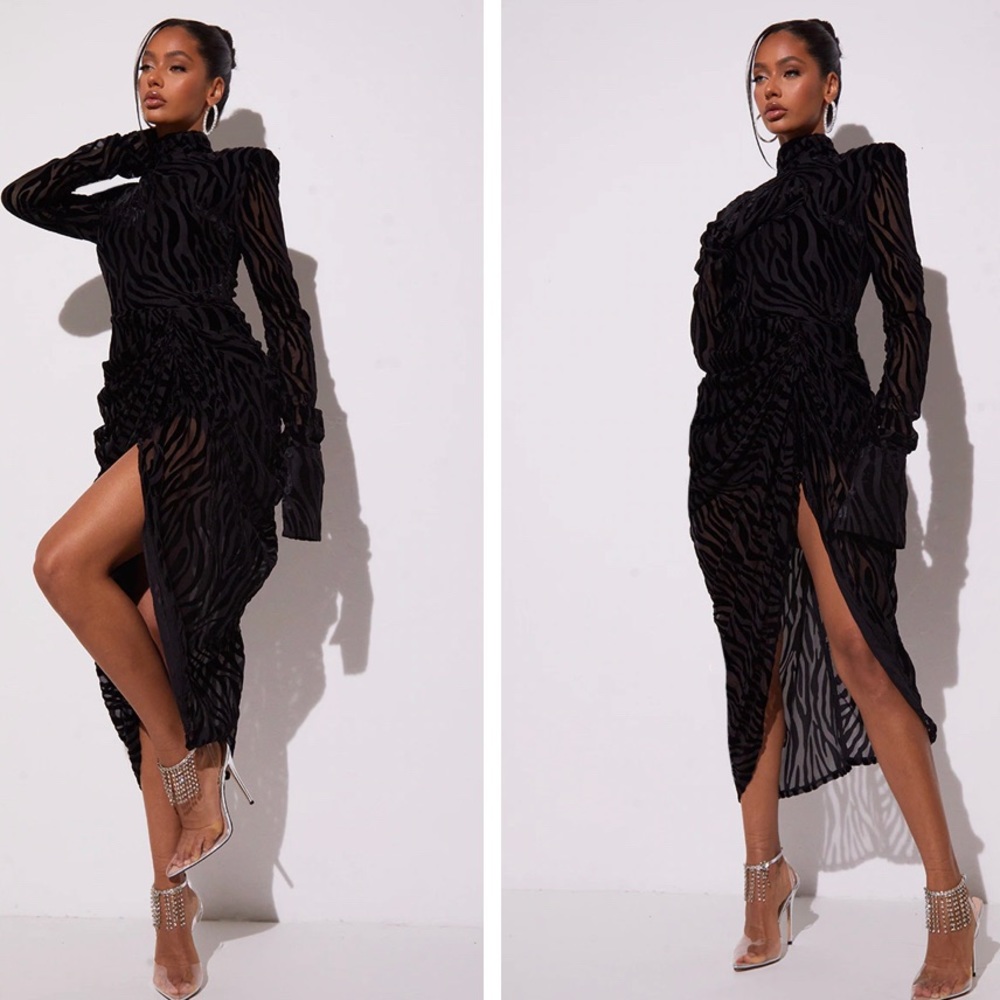 Black semi see through dress , exactly as shown as picture wore only once